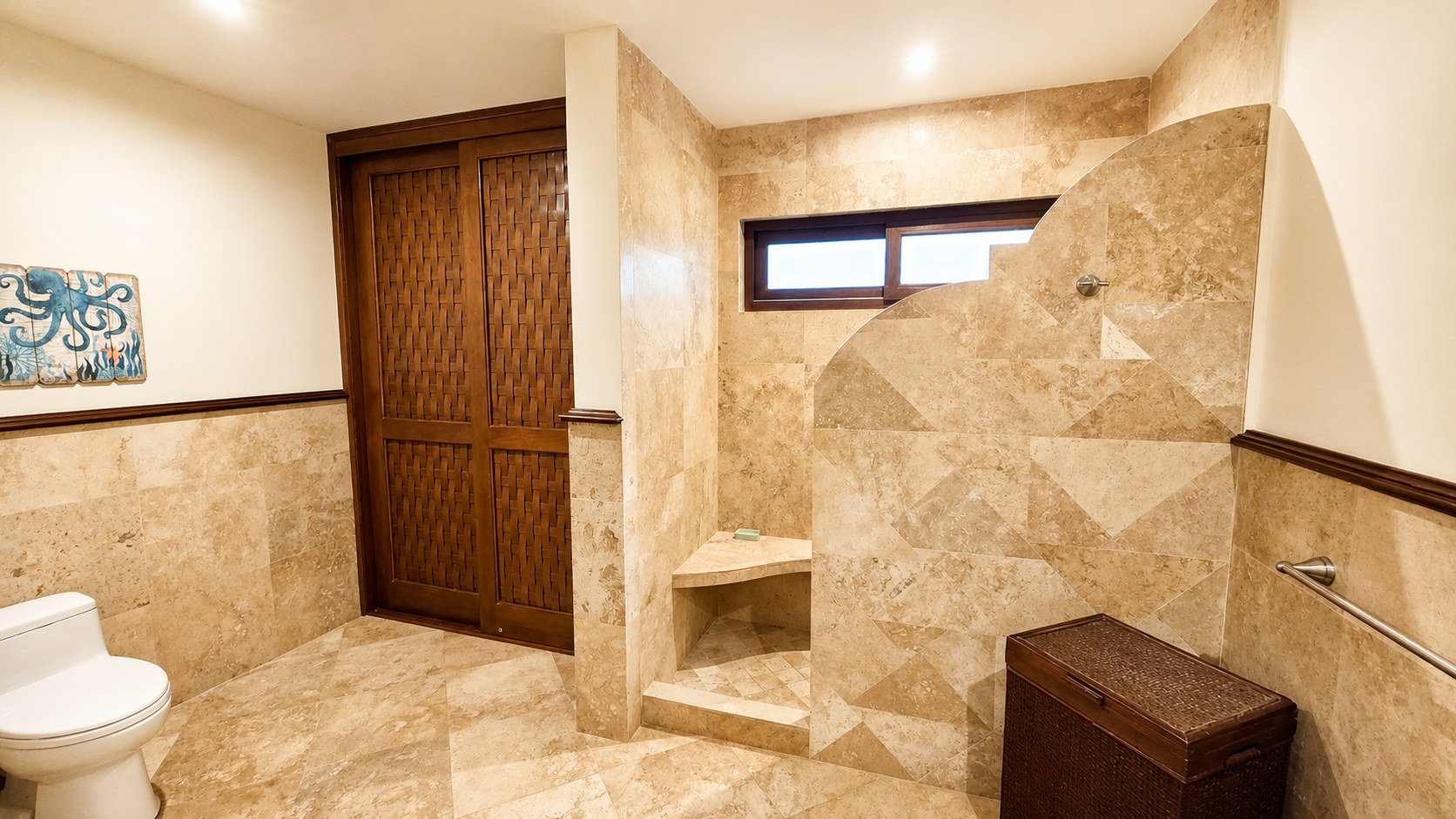 Stone bathroom with walk-in shower at Villa Lazurena